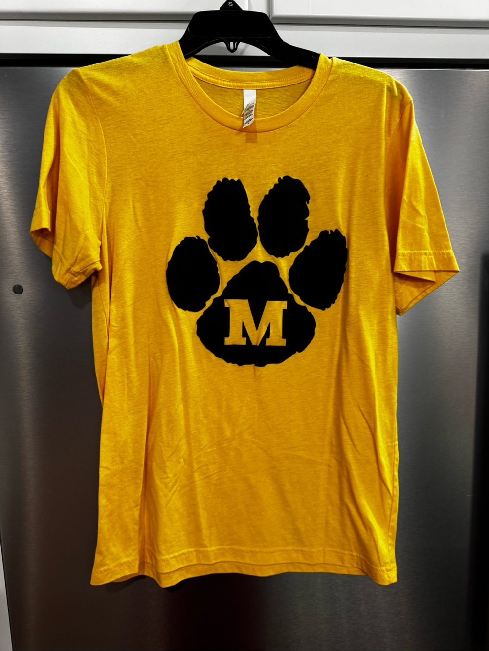 University of Missouri Yellow T-Shirt with Black Paw and 'M' Graphic